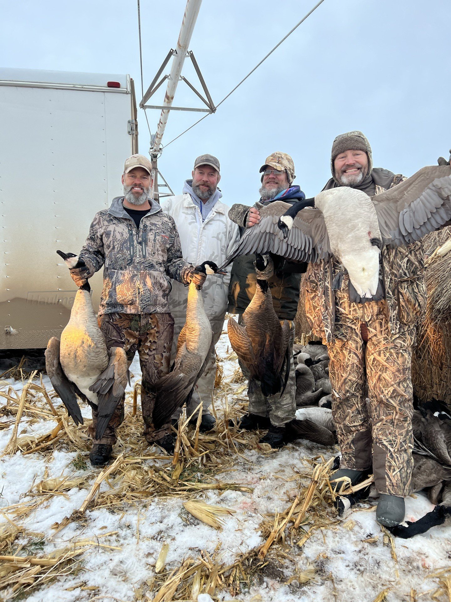 Goose hunt with favorite cousins and brother in a snowy cornfield