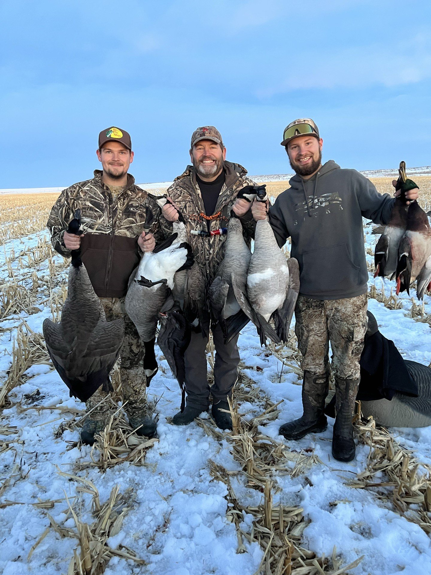 Kaden, Craig, and Keegan after a goose and duck hunt